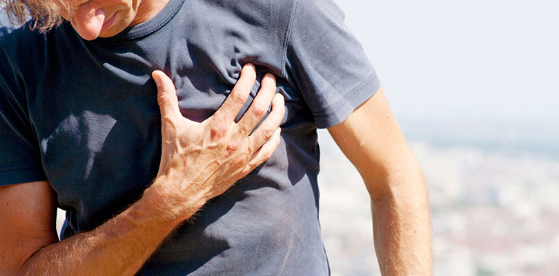 A man who has arthritis is experiencing chest pain