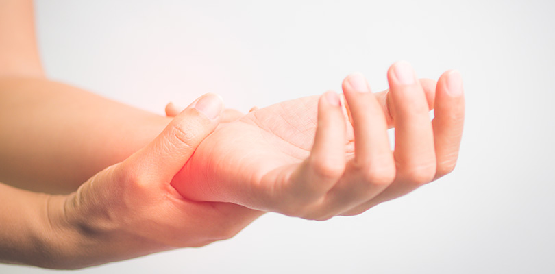 An individual is experiencing carpal tunnel symptoms